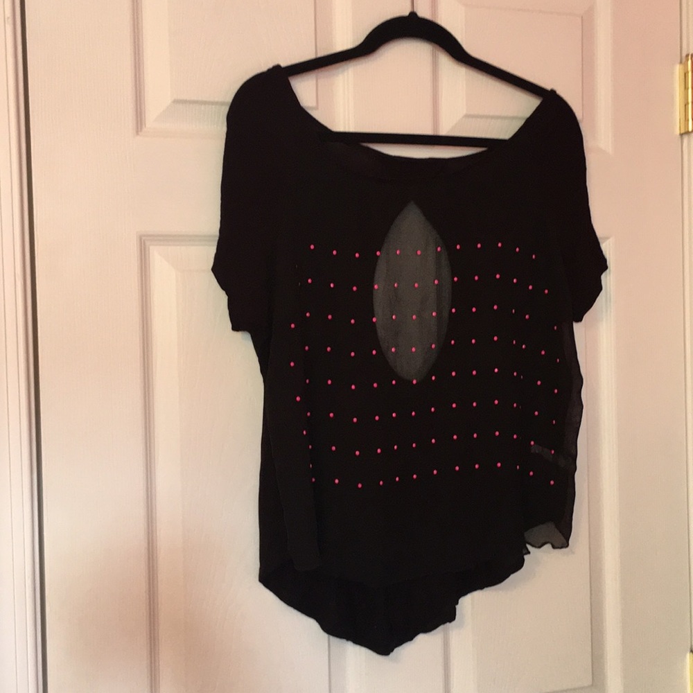 Sheer tee with pink accents and open back